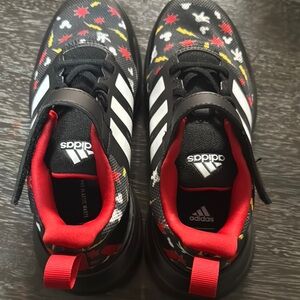 Adidas Black and Red Sneakers with Bold Design